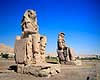 Colossi of Memnon. Memnos Kollosserne (Colossi of Memnon) Bygget af Pharaoh Amenhotep III ( Scan af KOL7697 )  Luxor Egypten Afrika  pharaoer, colossus
