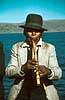 Man playing a flute  Lake Titicaca Peru South America  