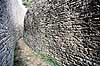 Great Zimbabwe. Great Zimbabwe - Great Enclosure - Parallel Passage mellem inder- og ydermur - Ordet Zimbabwe betyder stenhus p� shona. ( Scan af KOL3605 )   Great Zimbabwe / Masvingo Zimbabwe Afrika  Zimbabwe er opkaldt efter ruinerne
