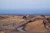 Lanzarote. Vej slynger sig mellem sm� vulkankratre i Timanfaya Nationalparken p� Lanzarote i De Kanariske �er  Parque Nacional de Timanfaya / Lanzarote Spanien   Vulkaner, vulkanisme, vulkan, lava