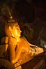 Buddha figure. K�mpe liggende Buddha i Wat Suwan Kuha Temple  i Ao Phang Nga National Park i Thailand    Thailand   sev�rdigheder, rejser, turisme, Wat Suwannakuha, Wat Tham