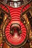 Livraria Lello. Trappen i Livraria Lello, som har givet inspiration til trapperne p� Hogwarts i Harry Potter filmene  Porto Portugal   B�ger, boghandel, boghandlere, r�d, trapper, design, Art Deco